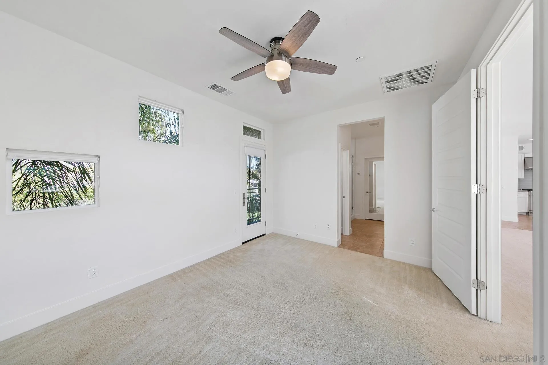 1935 North Vulcan Avenue Encinitas, CA 92024 - Photo 7 of 22 an empty room with closet and ceiling fan