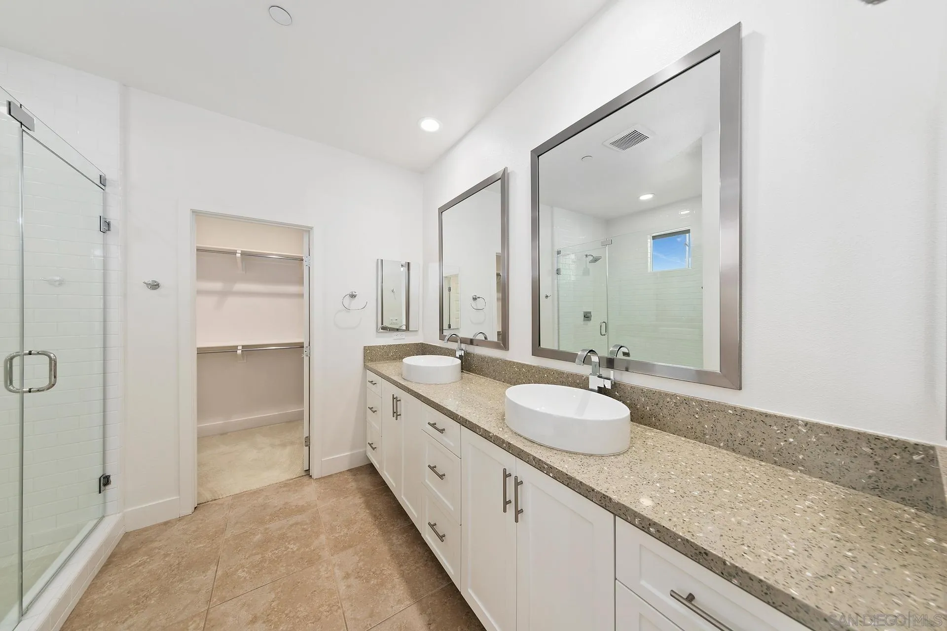 1935 North Vulcan Avenue Encinitas, CA 92024 - Photo 8 of 22 a bathroom with a granite countertop double vanity sink and mirror