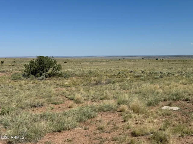 a view of beach and an ocean