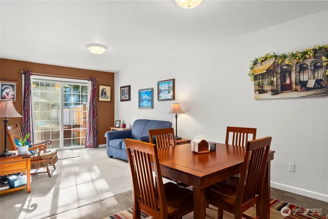 a view of a dining room with furniture