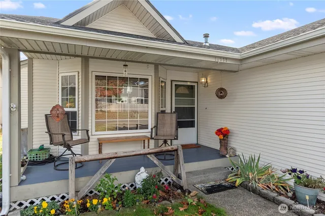 a front view of a house with a porch