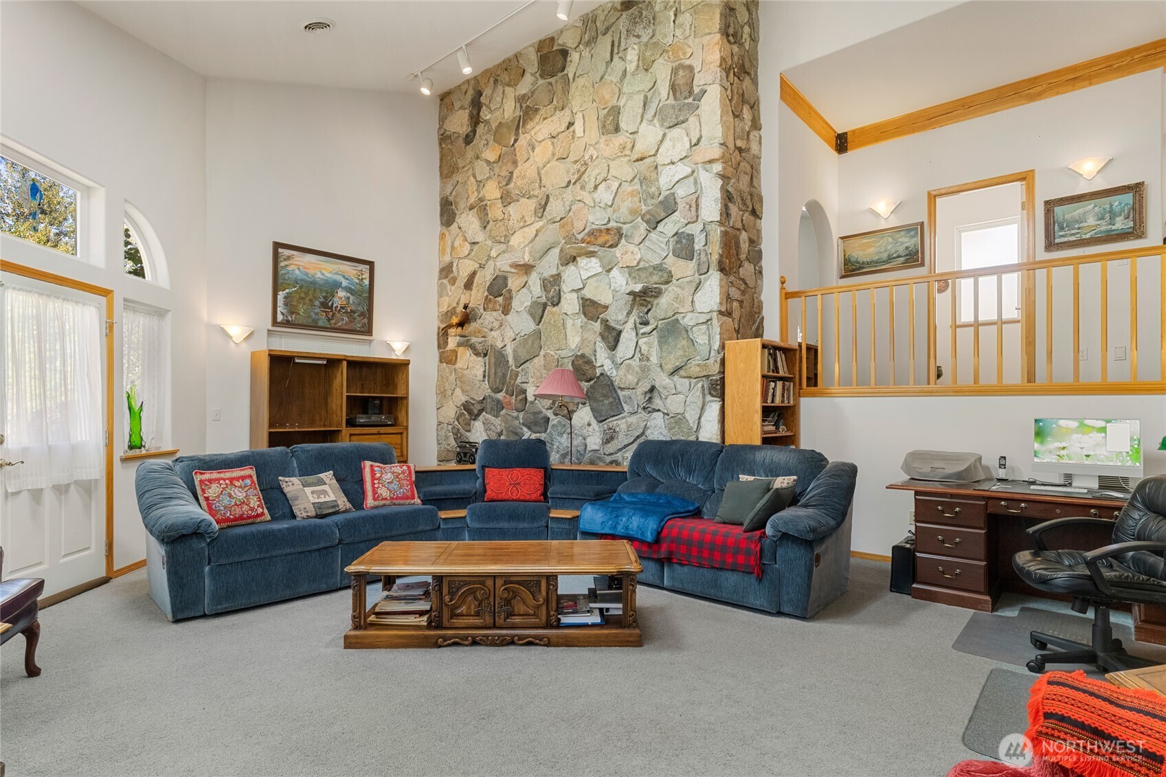 572 B W Chewuch Road Winthrop, WA 98862 - Photo 14 of 37 a living room with furniture and a fireplace
