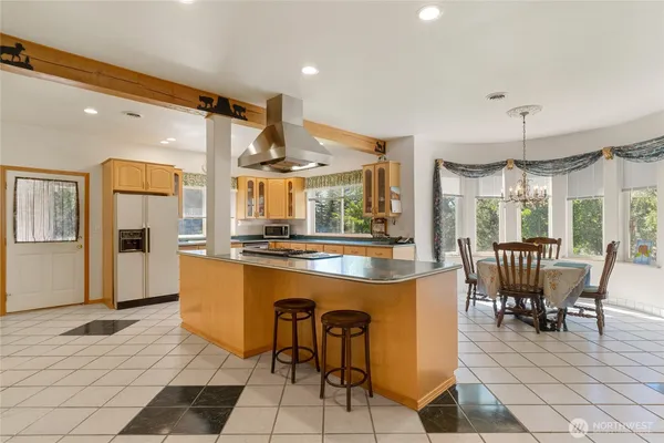 a view of a dining room with furniture