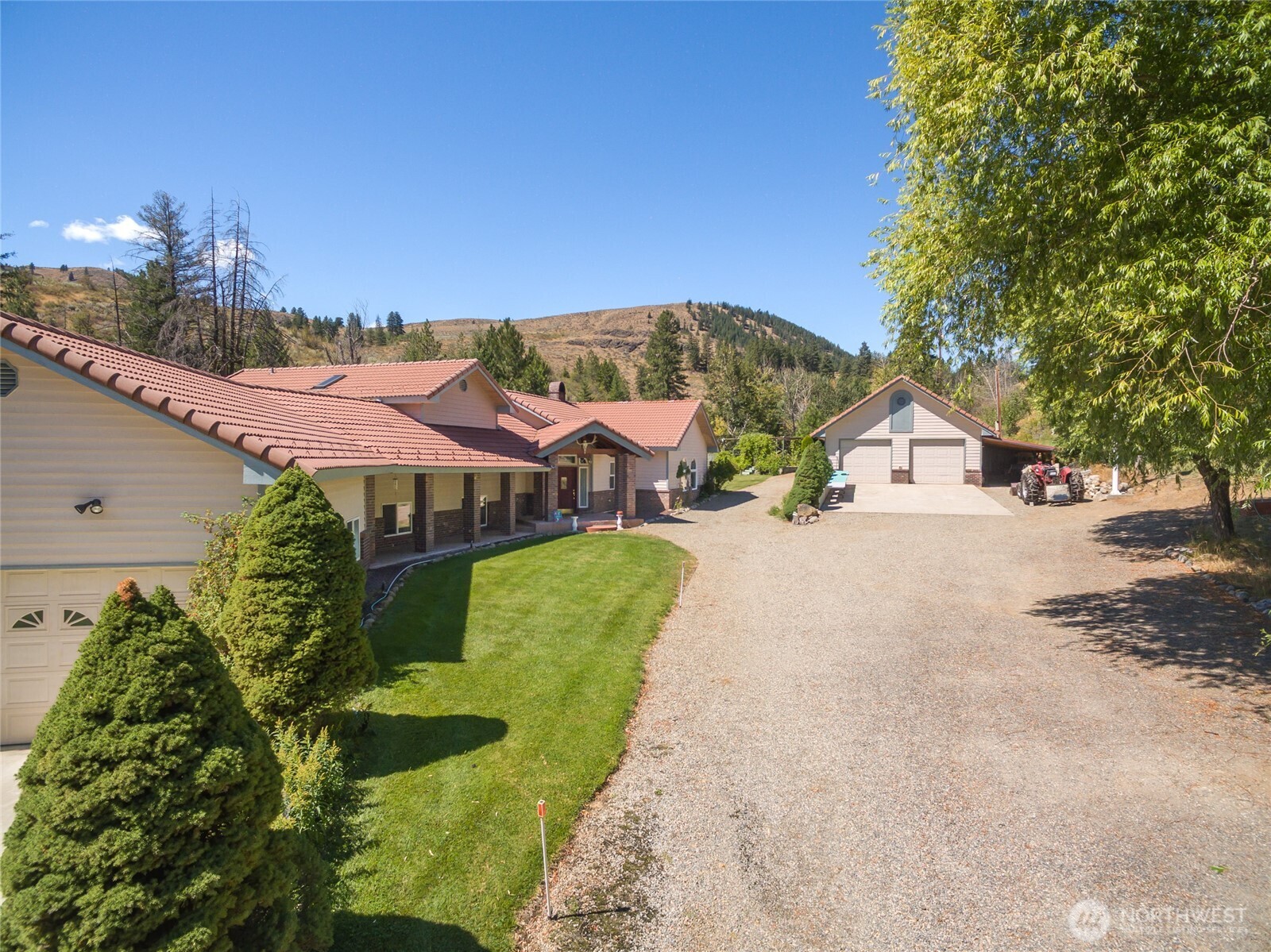 572 B W Chewuch Road Winthrop, WA 98862 - Photo 2 of 37 a view of house with outdoor space and street view