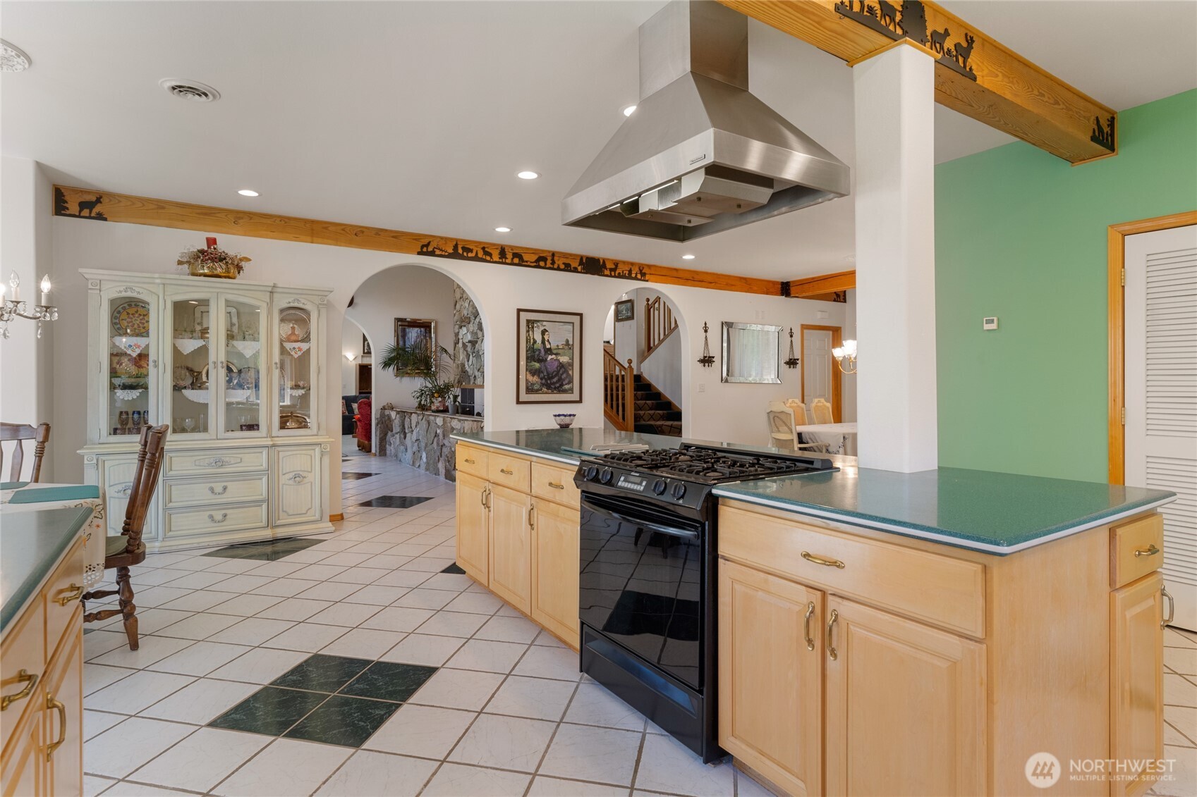572 B W Chewuch Road Winthrop, WA 98862 - Photo 23 of 37 a kitchen with stainless steel appliances granite countertop a sink and cabinets