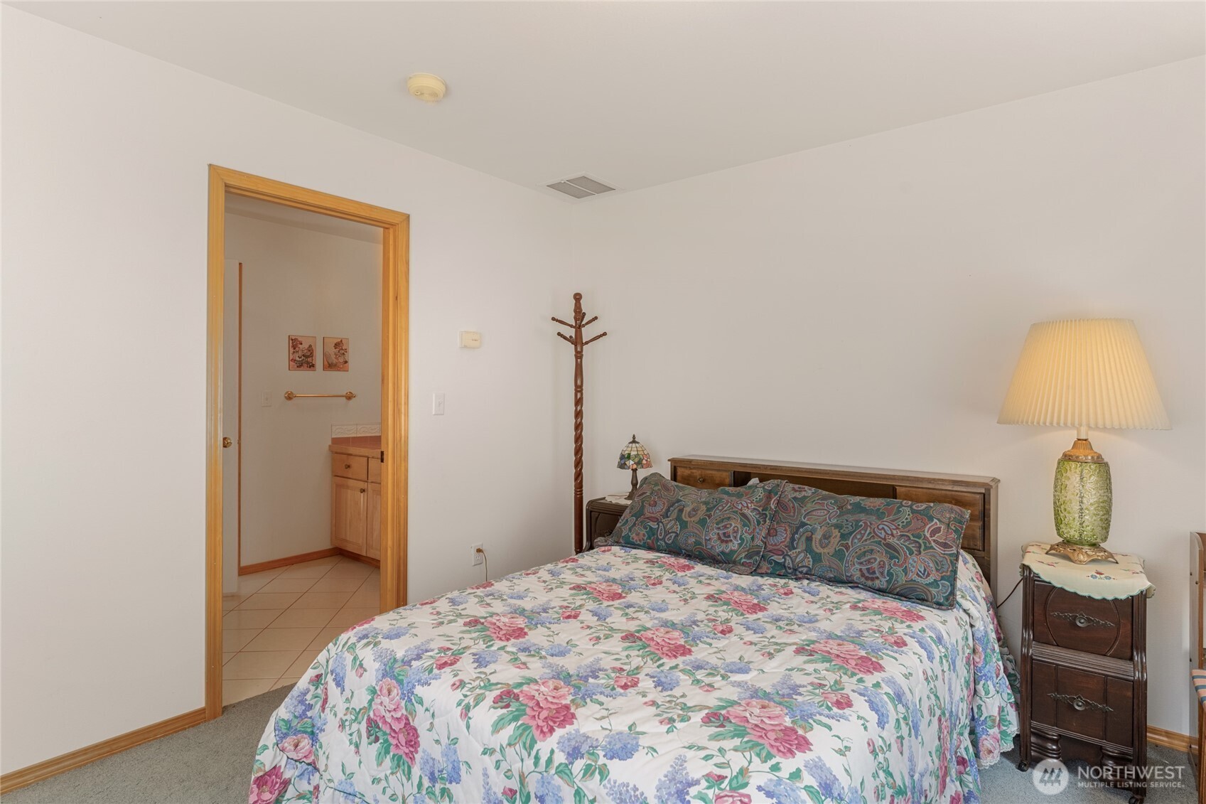 572 B W Chewuch Road Winthrop, WA 98862 - Photo 29 of 37 a bedroom with a bed and wooden floor