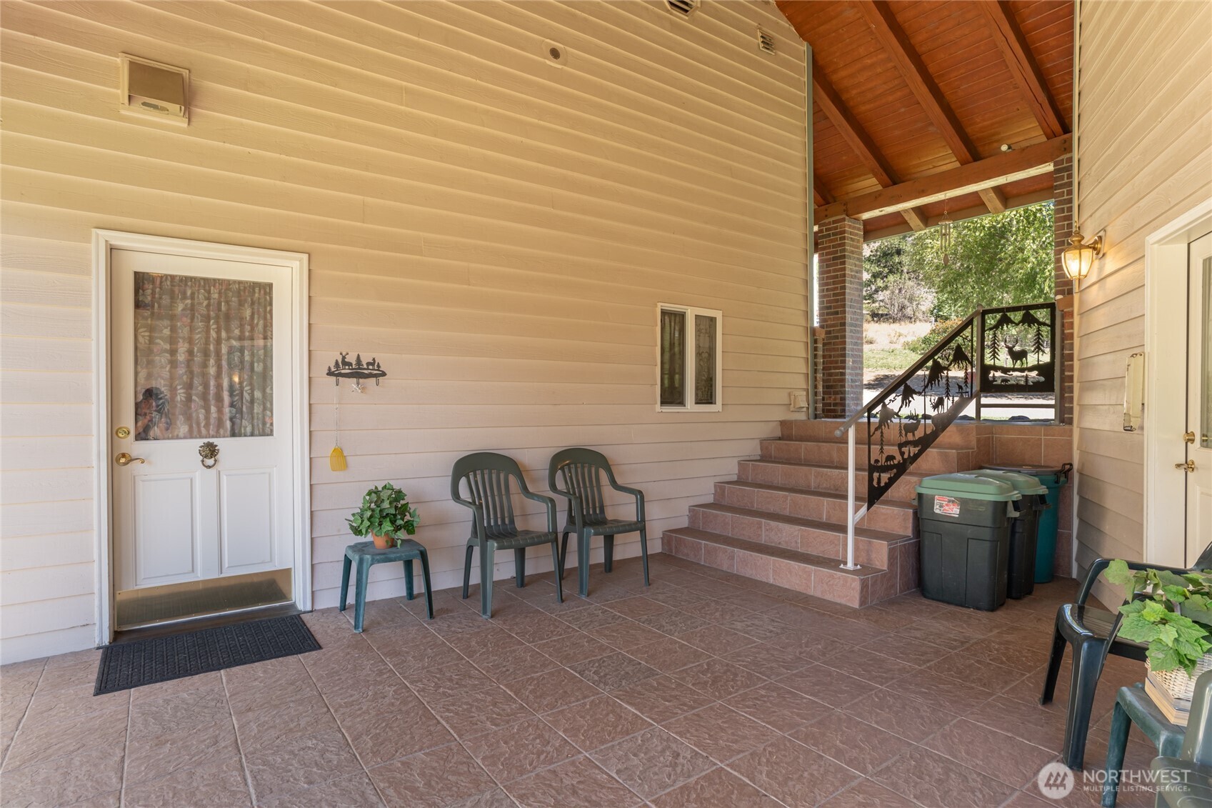572 B W Chewuch Road Winthrop, WA 98862 - Photo 31 of 37 a view of a patio with chairs and potted plants