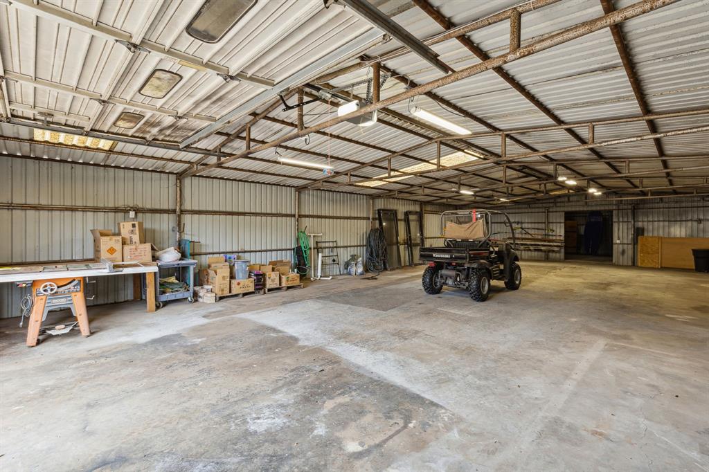 7342 Briar Road Azle, TX 76020 - Photo 40 of 40 2300 sq ft Garage / Workshop with sliding side doors and automatic garage door opener