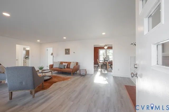 an empty room with a empty space and windows