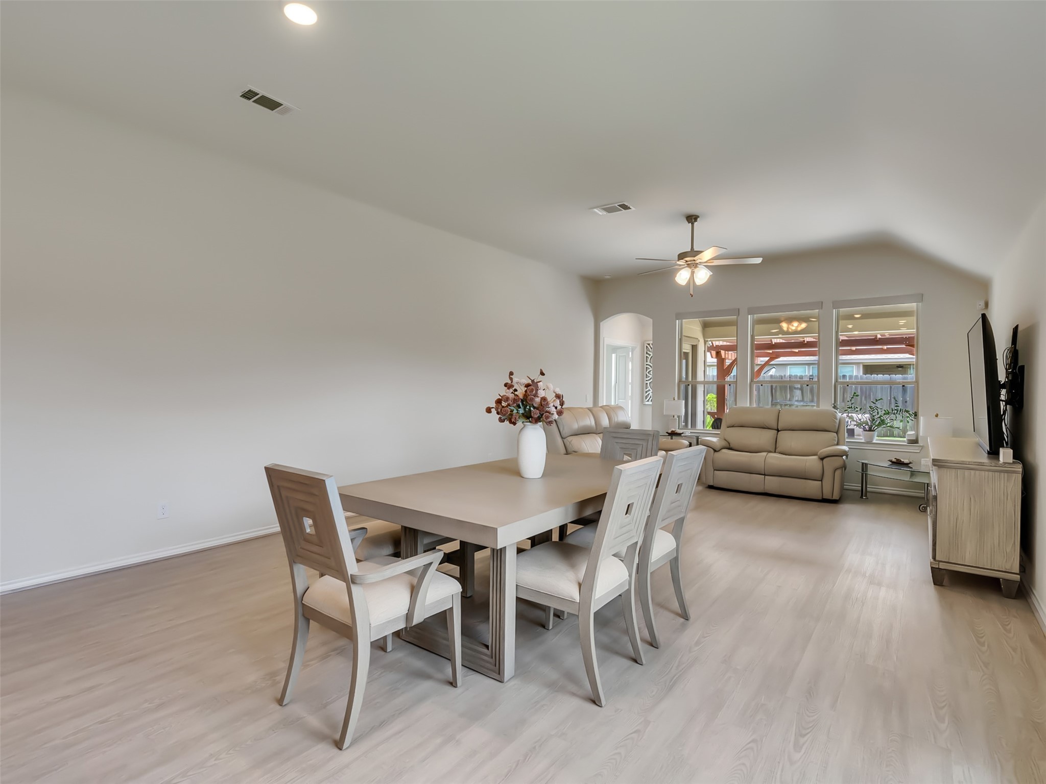 27997 Lone Hollow Lane Spring, TX 77386 - Photo 28 of 45 a view of a dining room with furniture and wooden floor