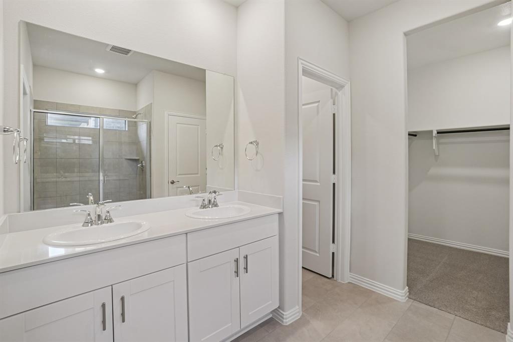 1633 Arches Road Anna, TX 75409 - Photo 26 of 29 Photo is not of the actual home, but is an inspirational photo of builder’s model home and may depict options, furnishings, and/or decorator features that are not included.