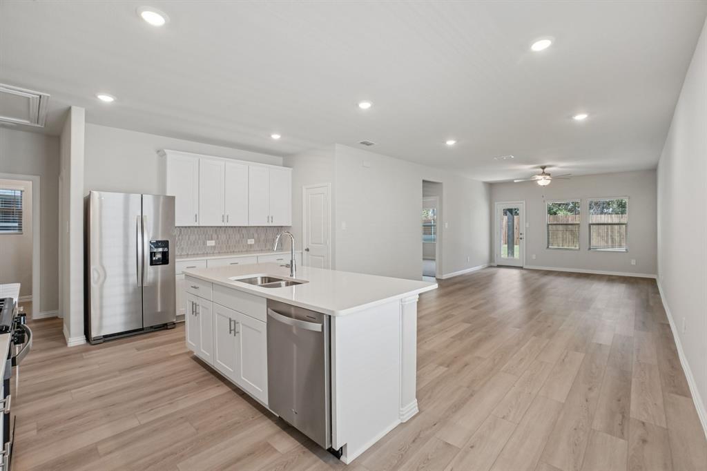 1633 Arches Road Anna, TX 75409 - Photo 6 of 29 Photo is not of the actual home, but is an inspirational photo of builder’s model home and may depict options, furnishings, and/or decorator features that are not included.