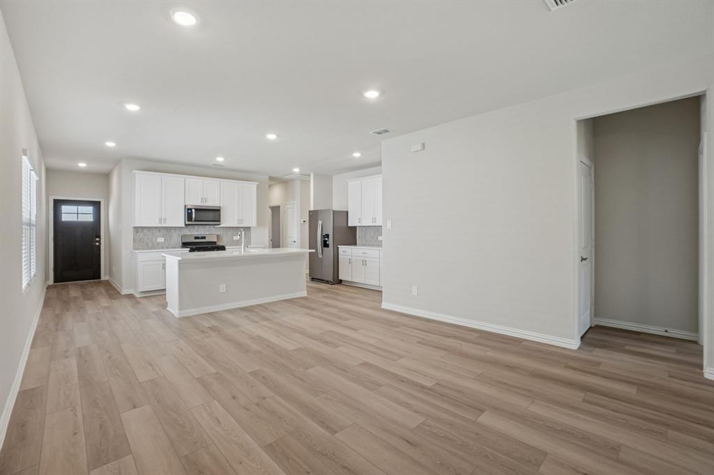 1633 Arches Road Anna, TX 75409 - Photo 8 of 29 Photo is not of the actual home, but is an inspirational photo of builder’s model home and may depict options, furnishings, and/or decorator features that are not included.