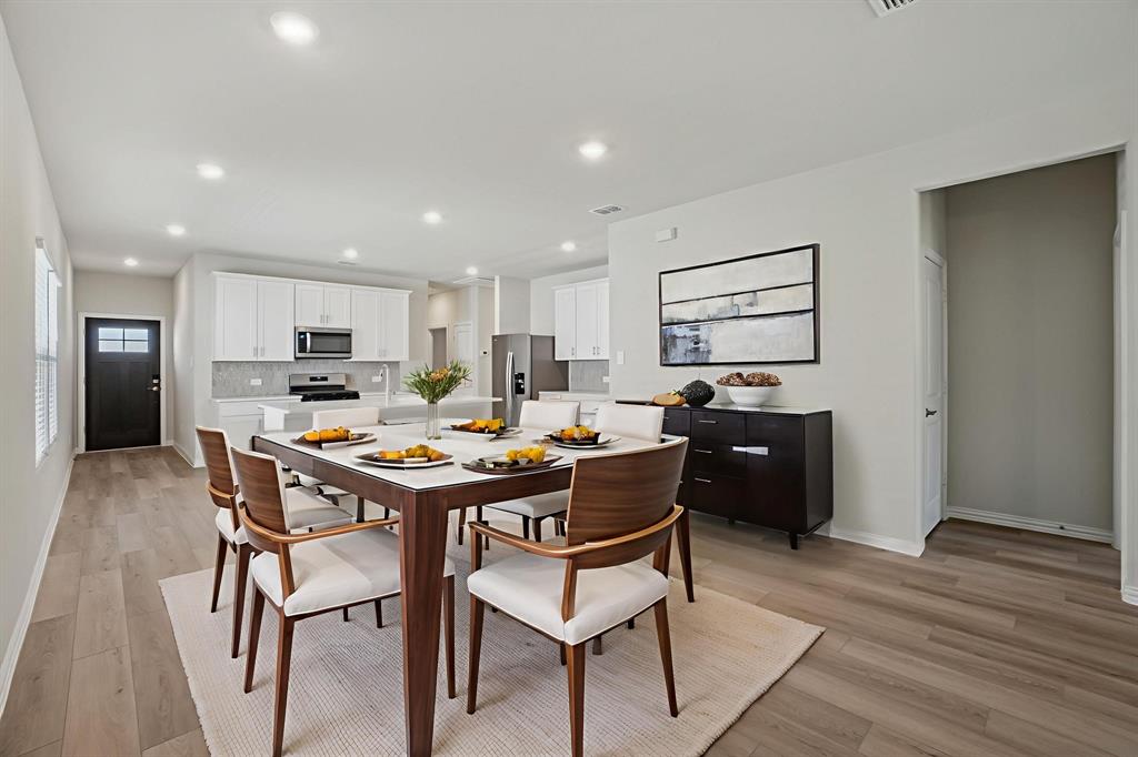 1633 Arches Road Anna, TX 75409 - Photo 9 of 29 Photo is not of the actual home, but is an inspirational photo of builder’s model home and may depict options, furnishings, and/or decorator features that are not included.