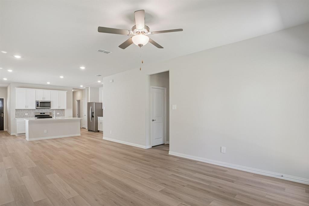 1633 Arches Road Anna, TX 75409 - Photo 10 of 29 Photo is not of the actual home, but is an inspirational photo of builder’s model home and may depict options, furnishings, and/or decorator features that are not included.