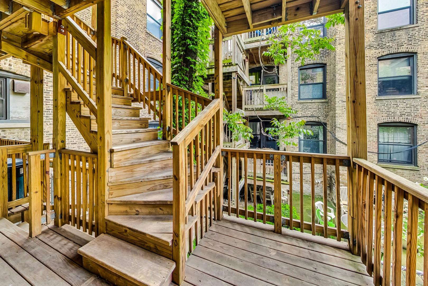 2108 North Seminary Avenue, Unit 5 Chicago, IL 60614 - Photo 15 of 16 a view of a house with wooden floor and stairs