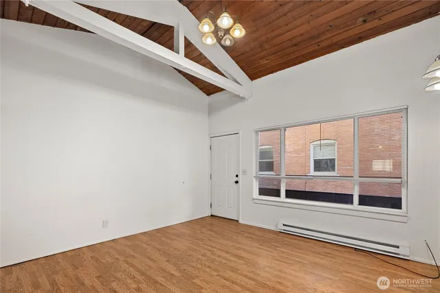 a view of an empty room with a window