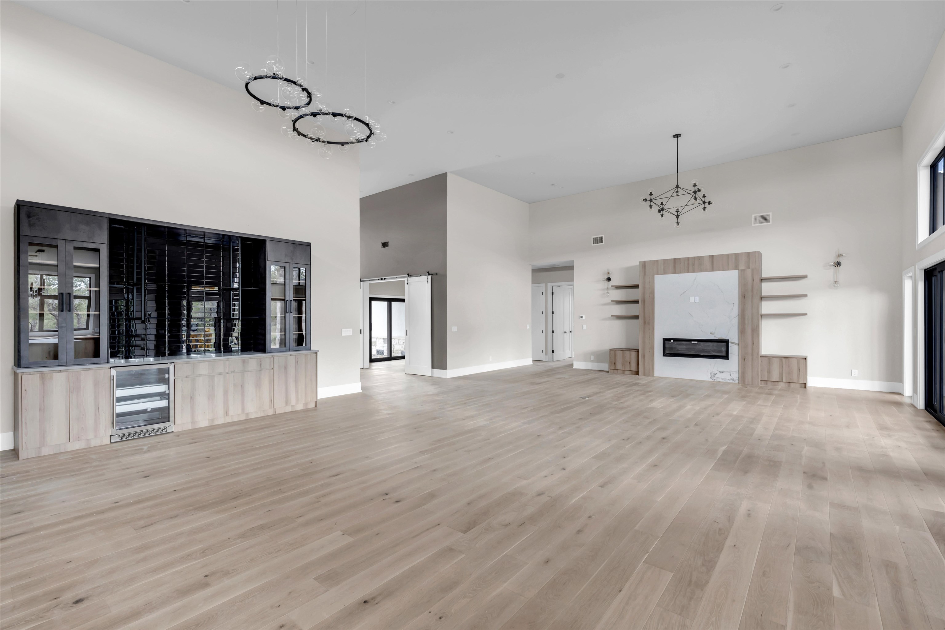6507 Ranch Road 962 West Round Mountain, TX 78663 - Photo 11 of 28 a view of a livingroom with a fireplace cabinet and window