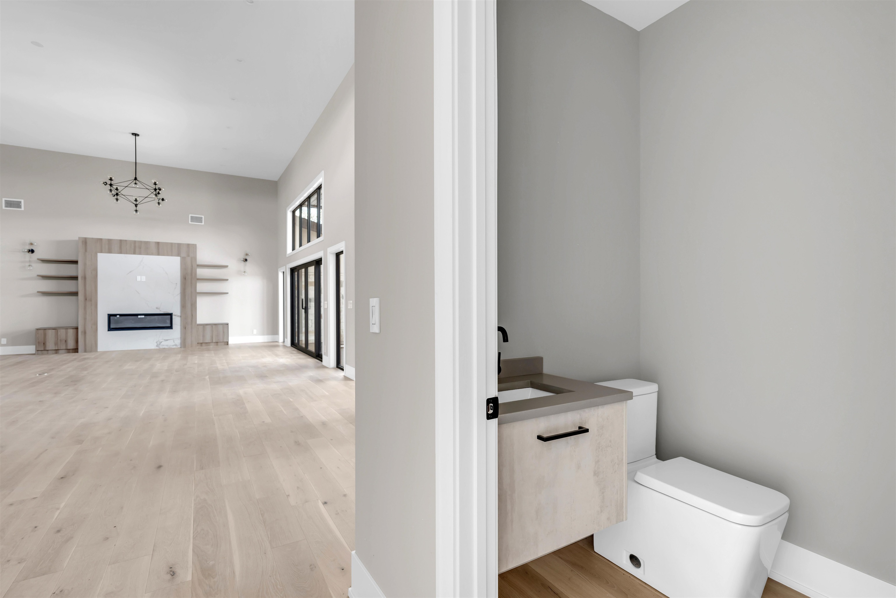 6507 Ranch Road 962 West Round Mountain, TX 78663 - Photo 13 of 28 a white toilet sitting next to a bathroom sink