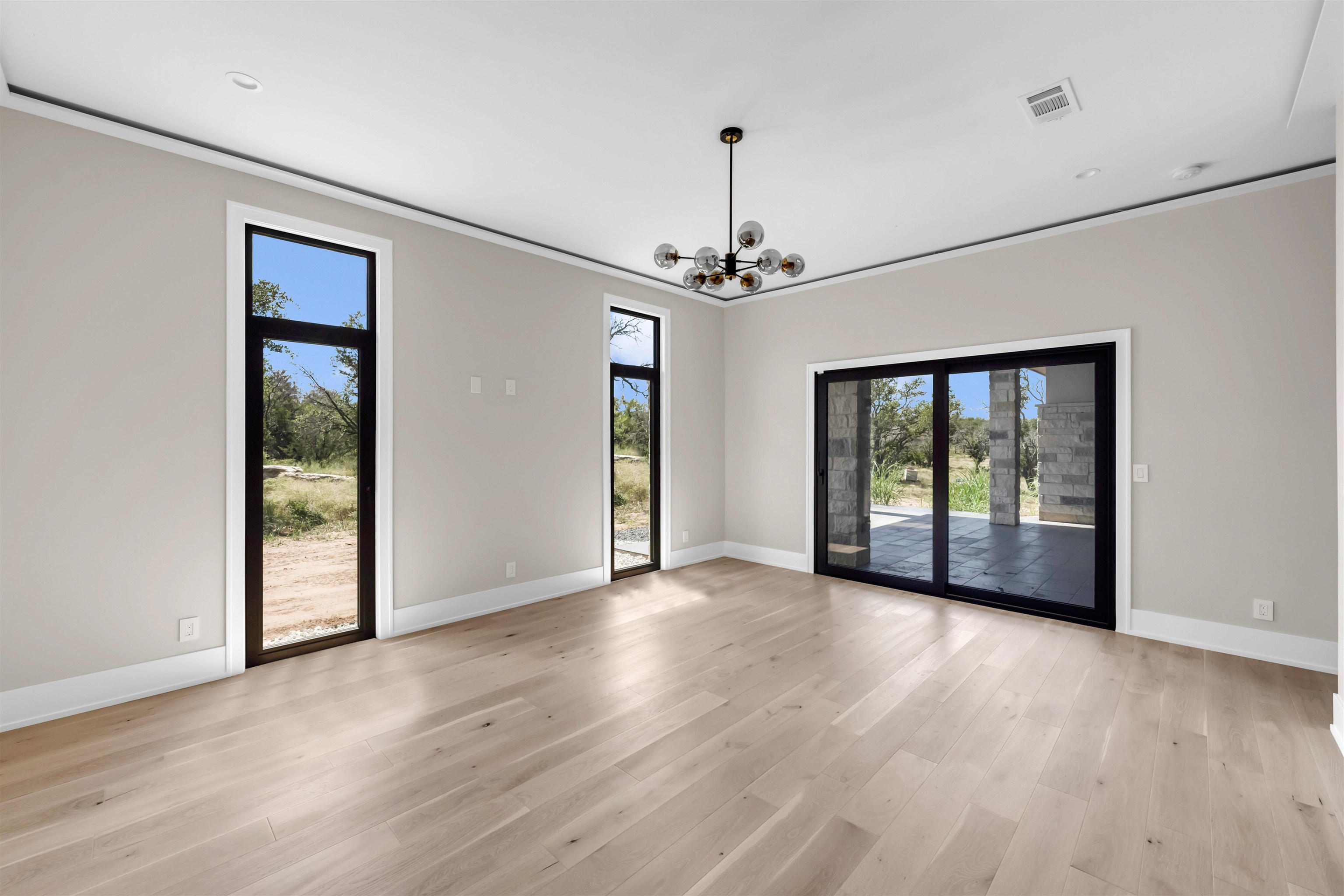 6507 Ranch Road 962 West Round Mountain, TX 78663 - Photo 17 of 28 a view of livingroom with hardwood floor and window