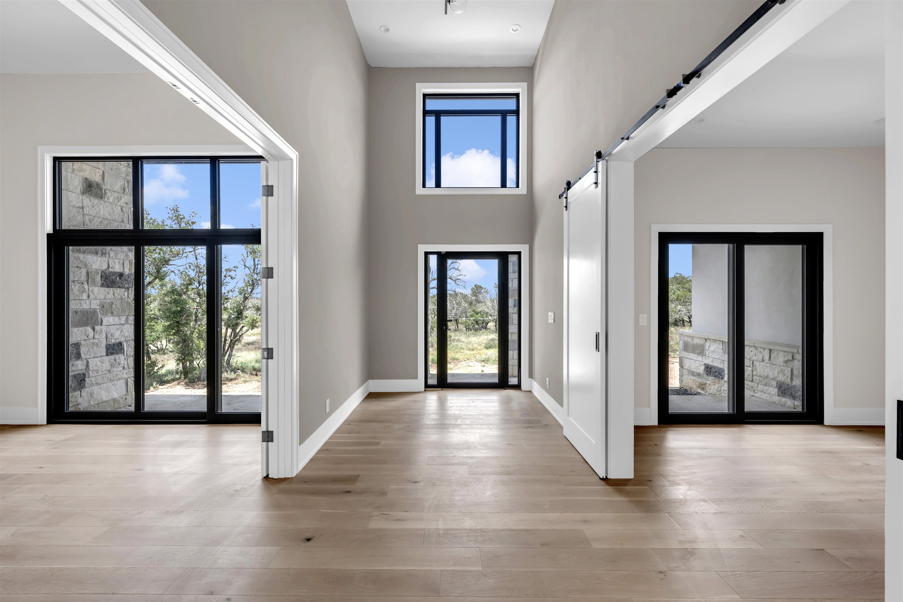 6507 Ranch Road 962 West Round Mountain, TX 78663 - Photo 8 of 28 a view of an entryway with wooden floor