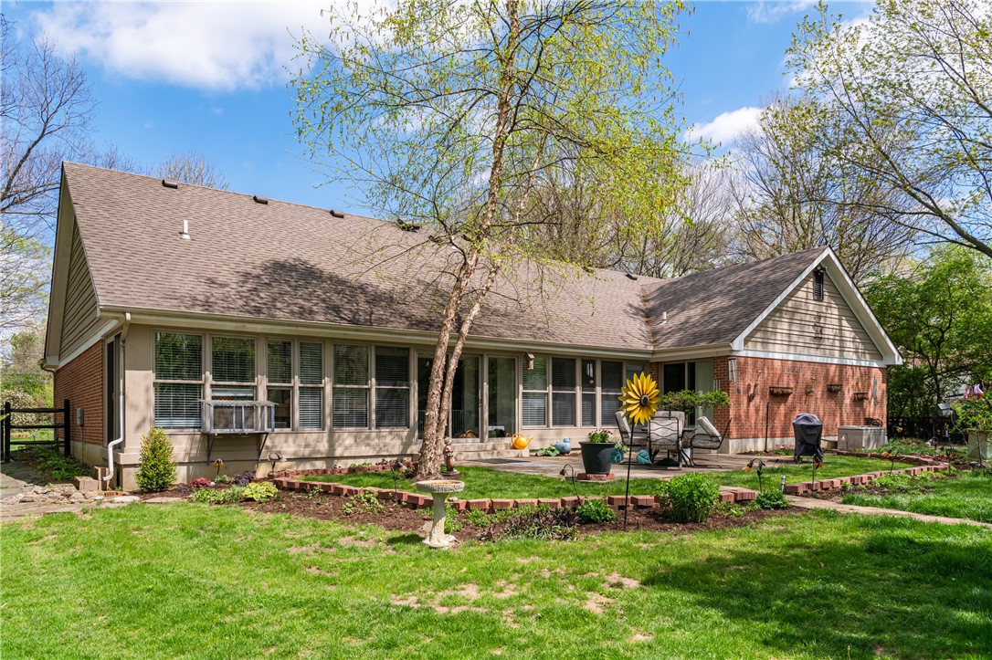 159 East Lytle 5 Points Road Springboro, OH 45066 - Photo 33 of 45 This residence showcases a well-maintained yard and a spacious patio area, perfect for outdoor living.
