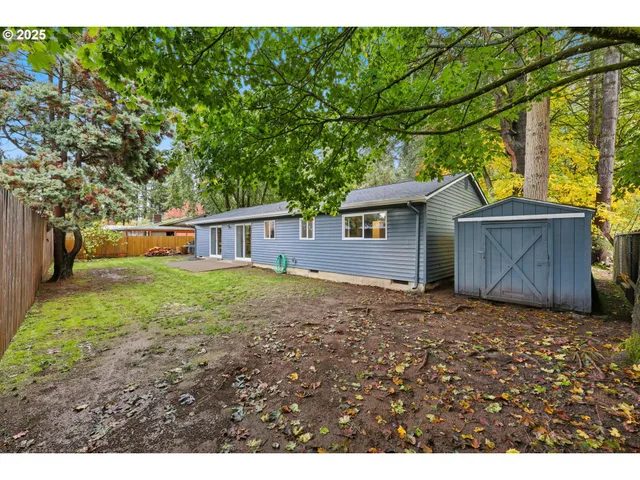 a house view with a backyard space