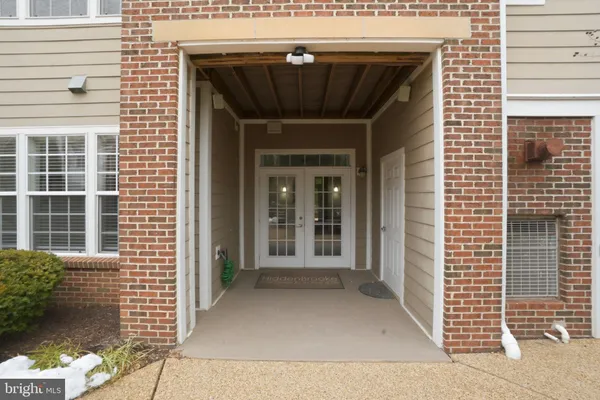 a front view of a house with a garage