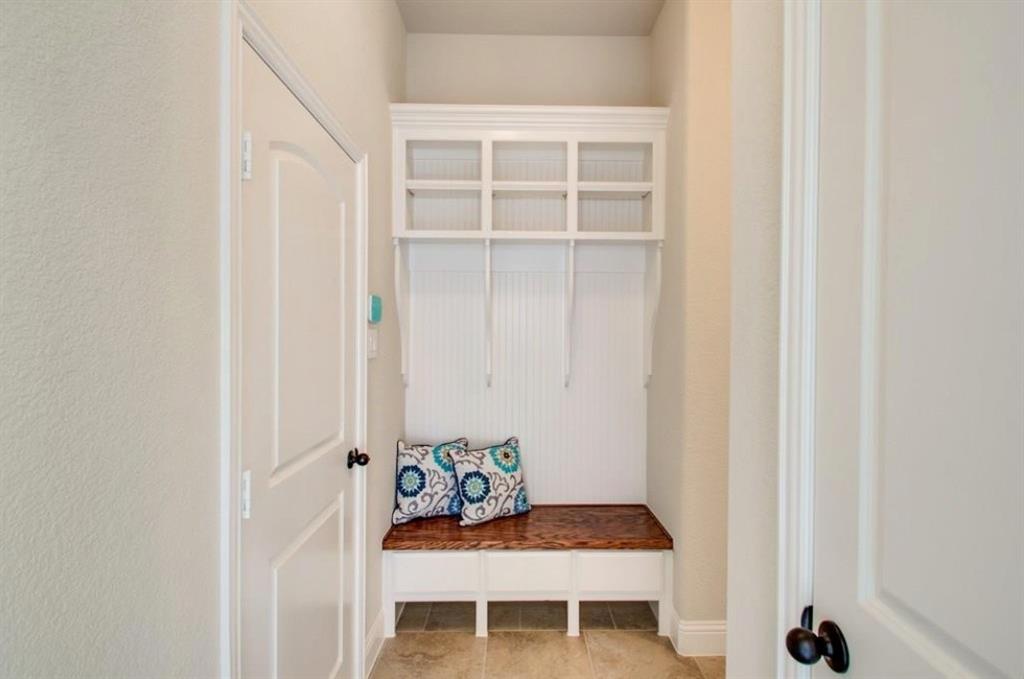 421 Prairie Run Aledo, TX 76008 - Photo 16 of 19 Mudroom featuring light tile patterned floors and baseboards