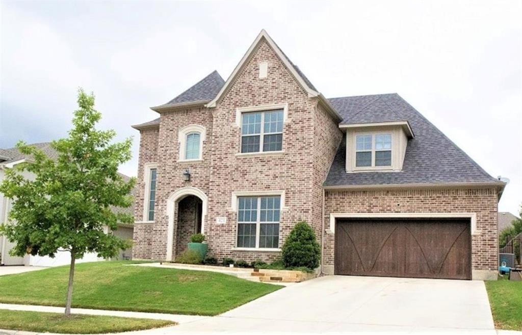 421 Prairie Run Aledo, TX 76008 - Photo 2 of 19 View of front of home featuring brick siding, concrete driveway, a front lawn, and a shingled roof