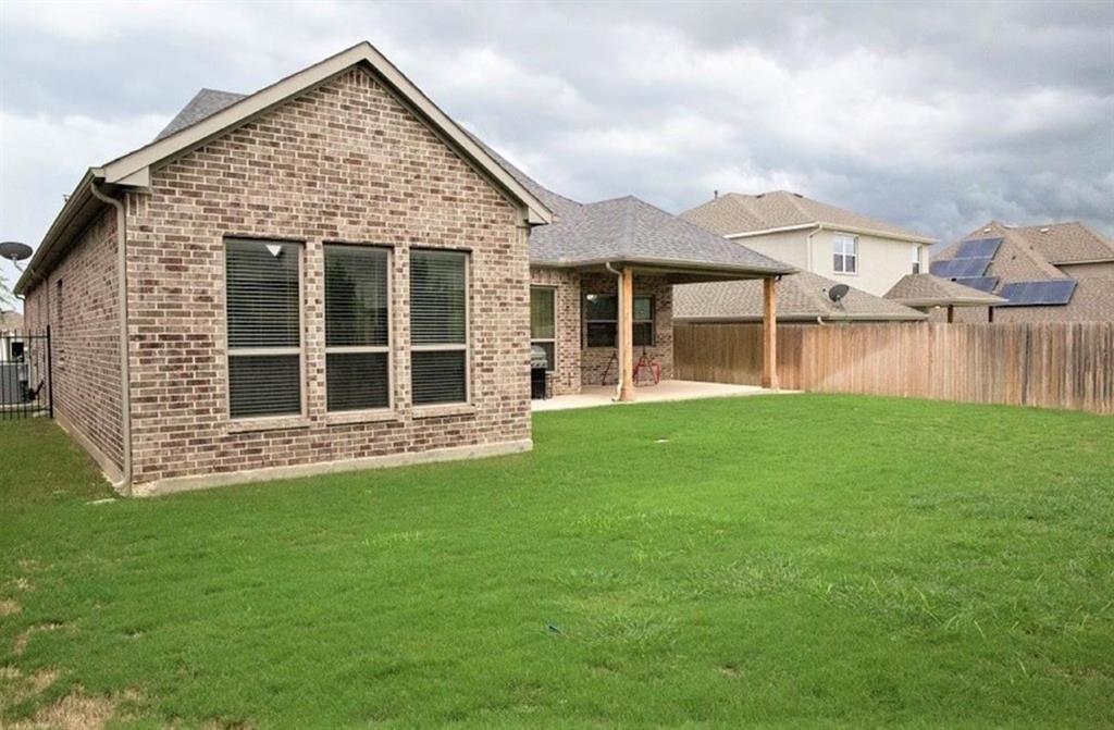 421 Prairie Run Aledo, TX 76008 - Photo 7 of 19 Rear view of house featuring brick siding and a patio area