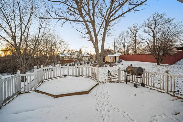 a view of a backyard with a snow