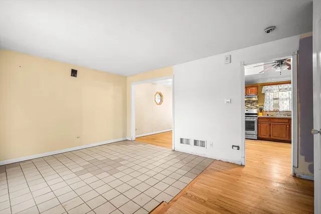 a view of a livingroom with wooden floor