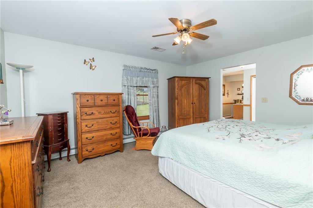 495 North Ben Franklin Road Indiana, PA 15701 - Photo 20 of 49 a bedroom with a bed and a dresser