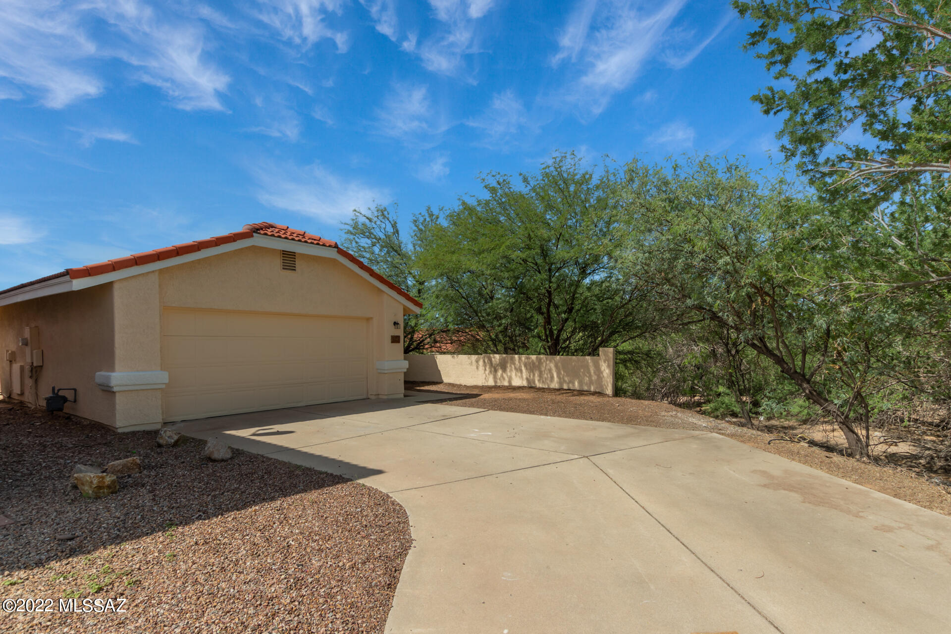 4697 West Weathervane Street Tucson, AZ 85741 - Photo 3 of 25 a view of a house with a yard