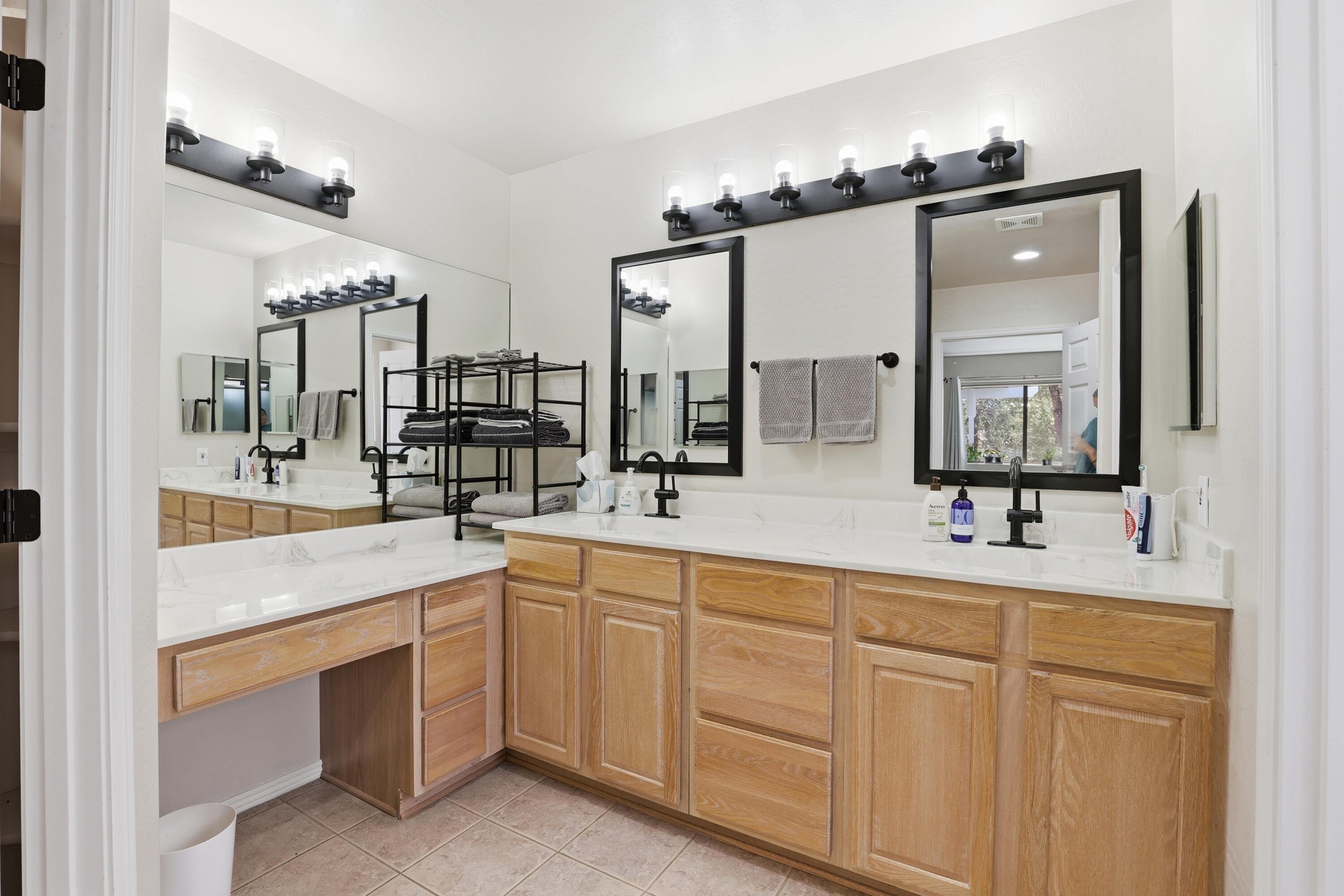 910 West Wagon Trail Payson, AZ 85541 - Photo 15 of 35 a spacious en suite bathroom with double sink and a mirror