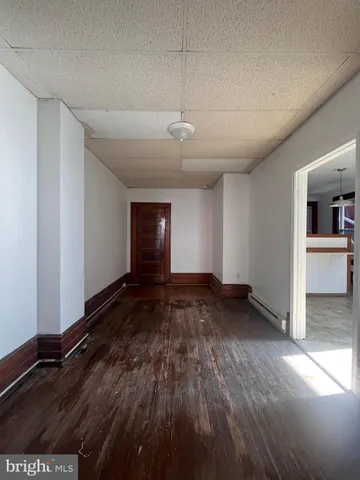a bathroom with a toilet sink and shower