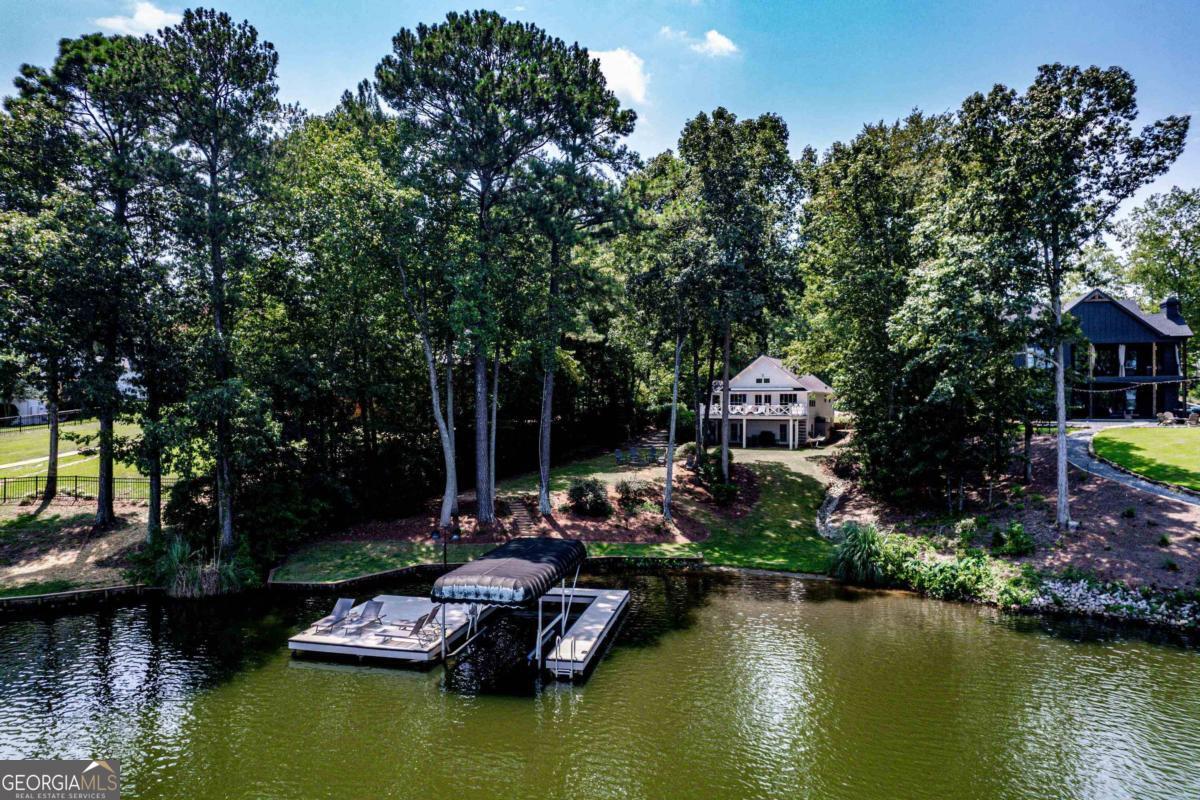 184 Hickory Point Buckhead, GA 30625 - Photo 1 of 1 a view of swimming pool with plants and trees