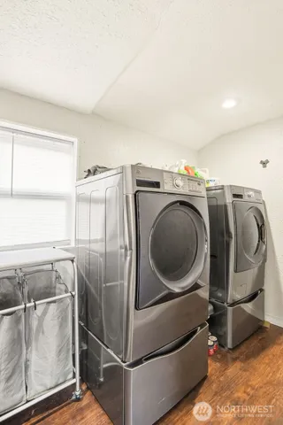 a utility room with dryer and washer