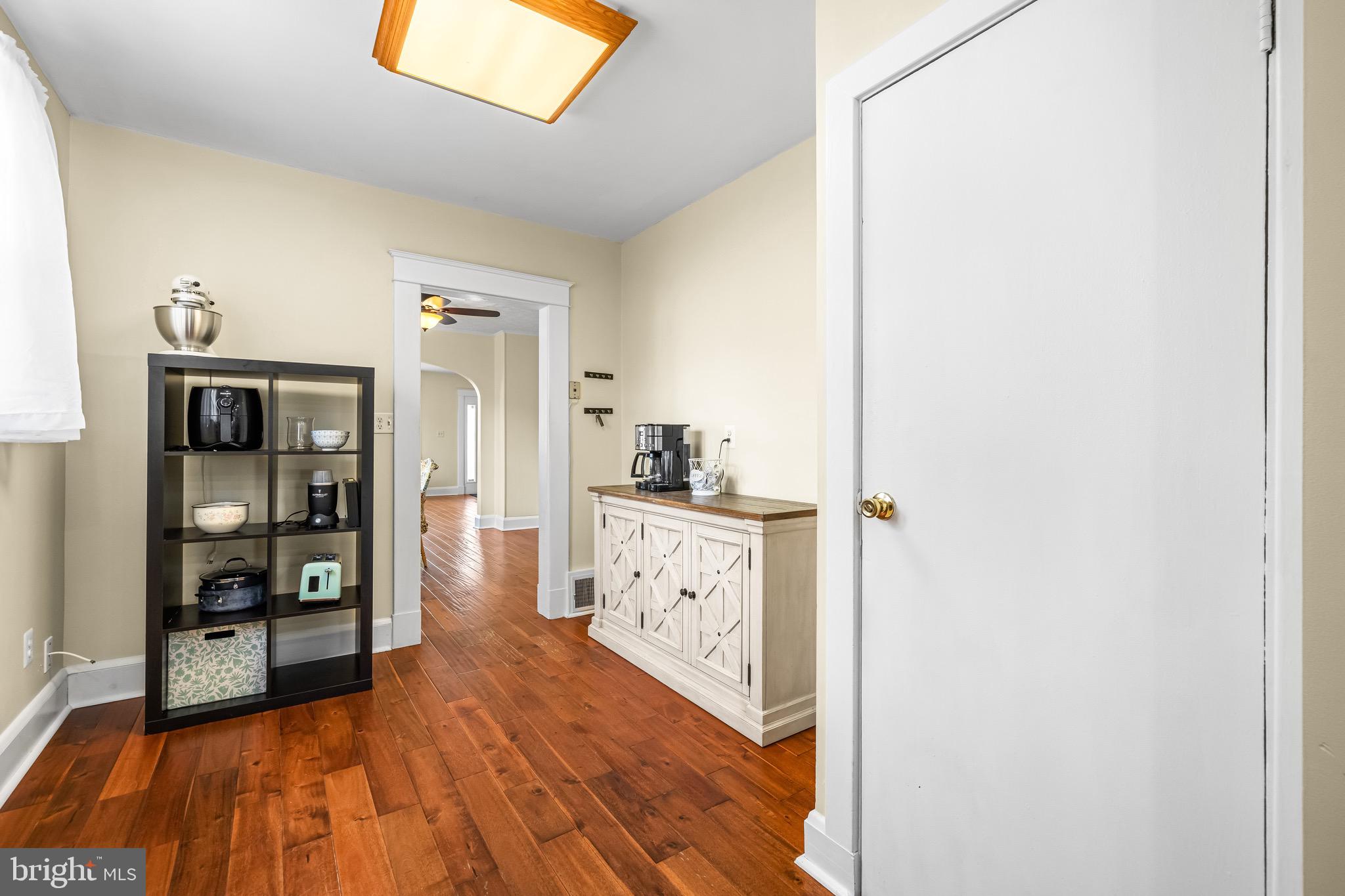 2913 Ritchie Avenue Baltimore, MD 21219 - Photo 11 of 34 a kitchen with stainless steel appliances granite countertop a refrigerator and a stove top oven