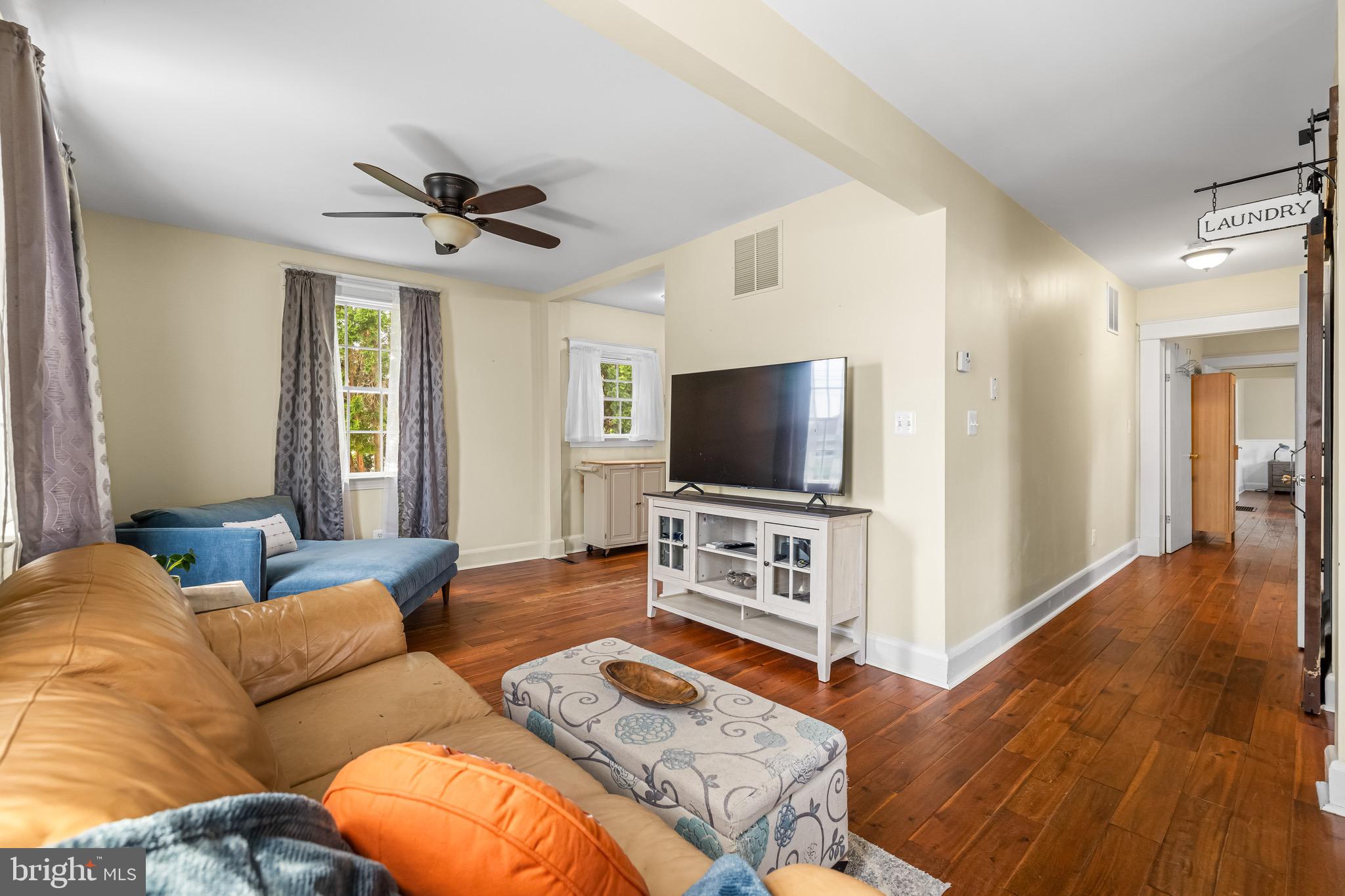 2913 Ritchie Avenue Baltimore, MD 21219 - Photo 14 of 34 a living room with furniture and a flat screen tv