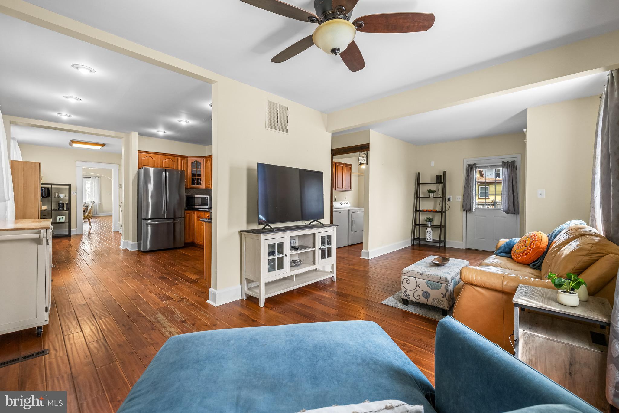 2913 Ritchie Avenue Baltimore, MD 21219 - Photo 16 of 34 a living room with furniture and a flat screen tv