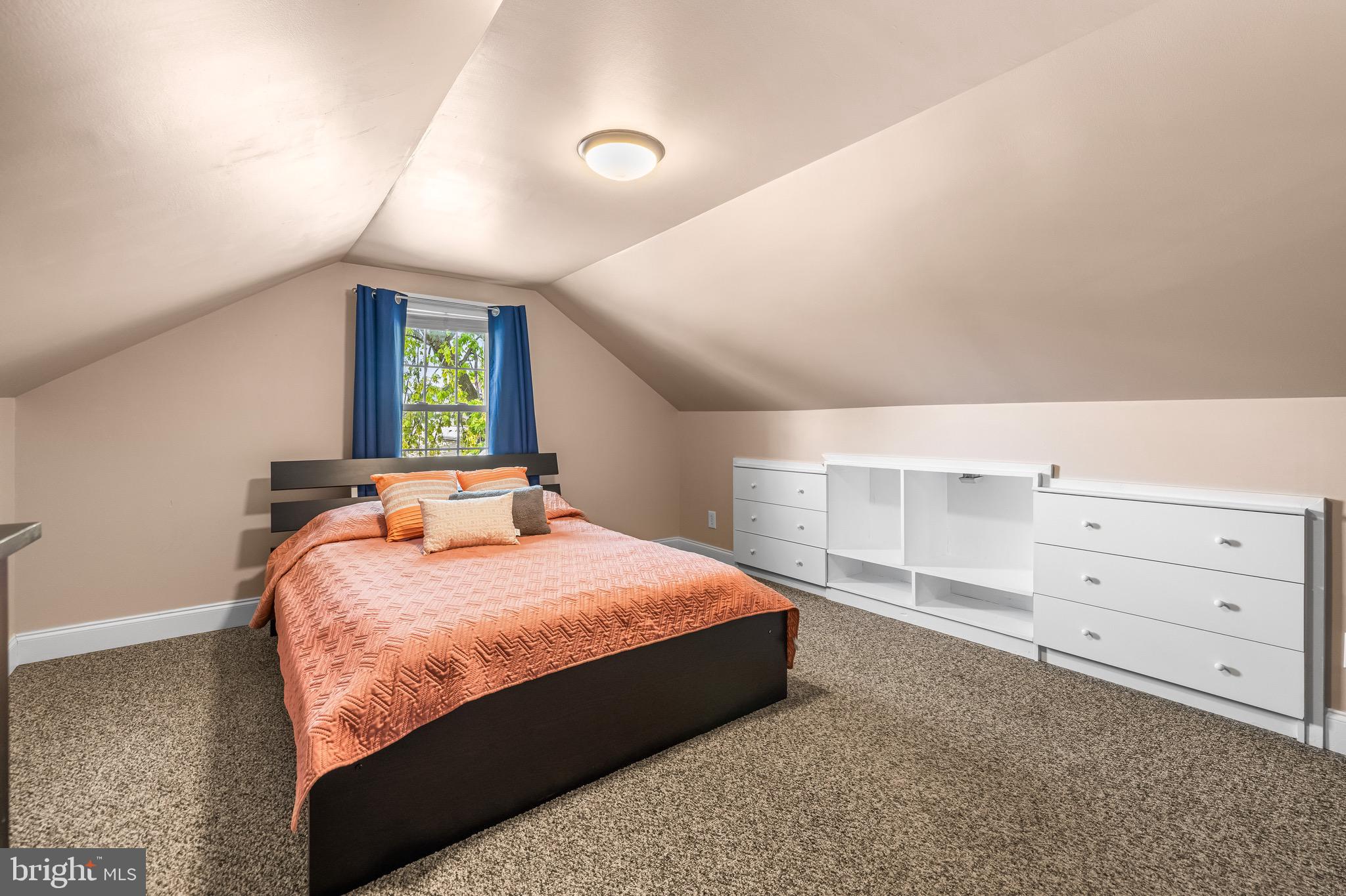 2913 Ritchie Avenue Baltimore, MD 21219 - Photo 26 of 34 a bedroom with a bed and window