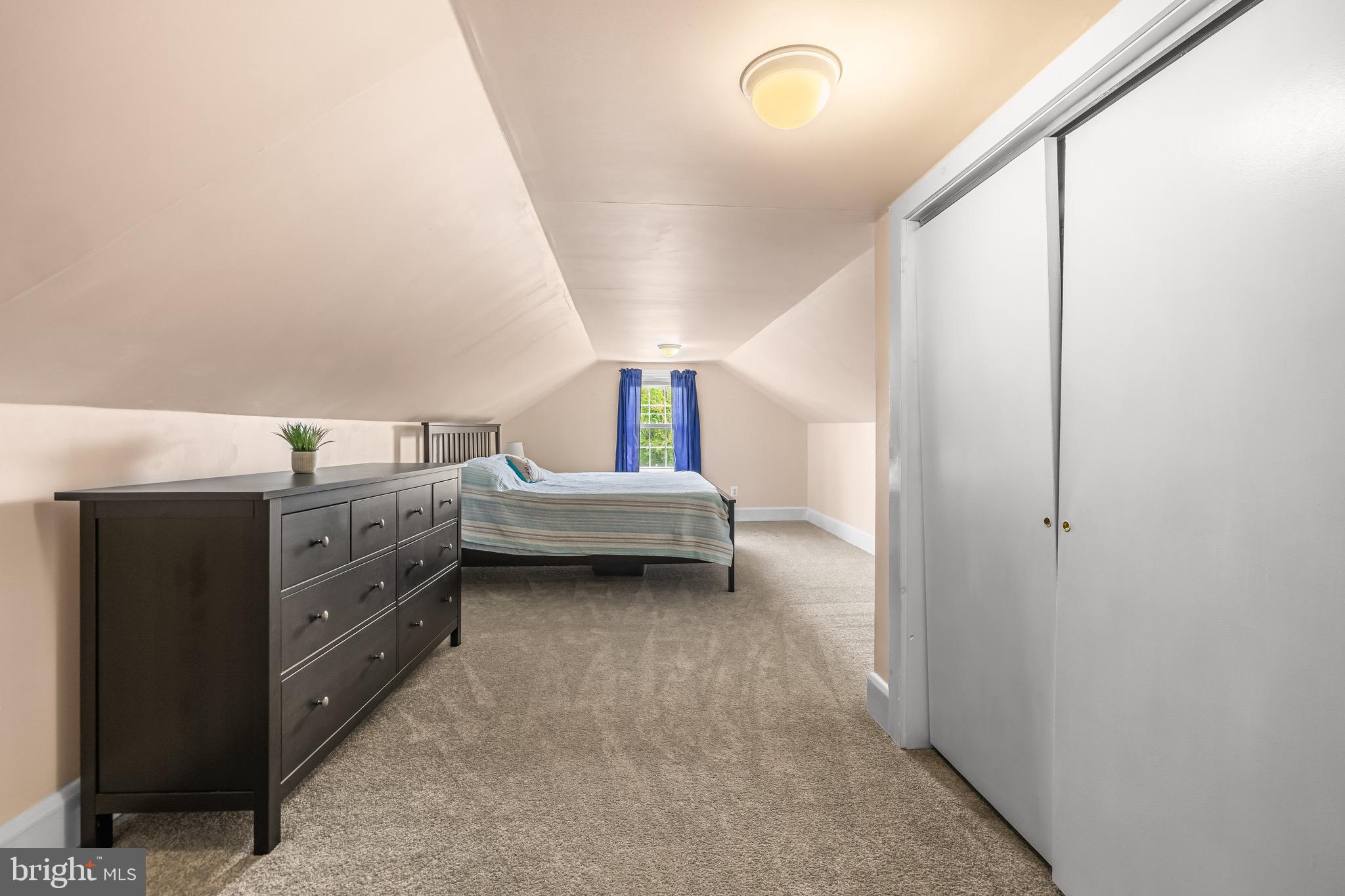 2913 Ritchie Avenue Baltimore, MD 21219 - Photo 27 of 34 a view of a bedroom with bed and cabinets