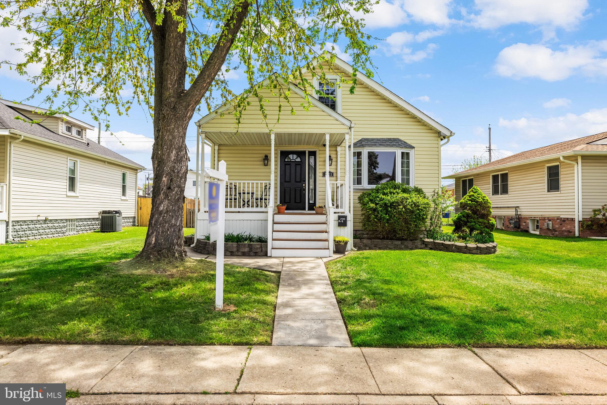 2913 Ritchie Avenue Baltimore, MD 21219 - Photo 34 of 34 a front view of a house with garden