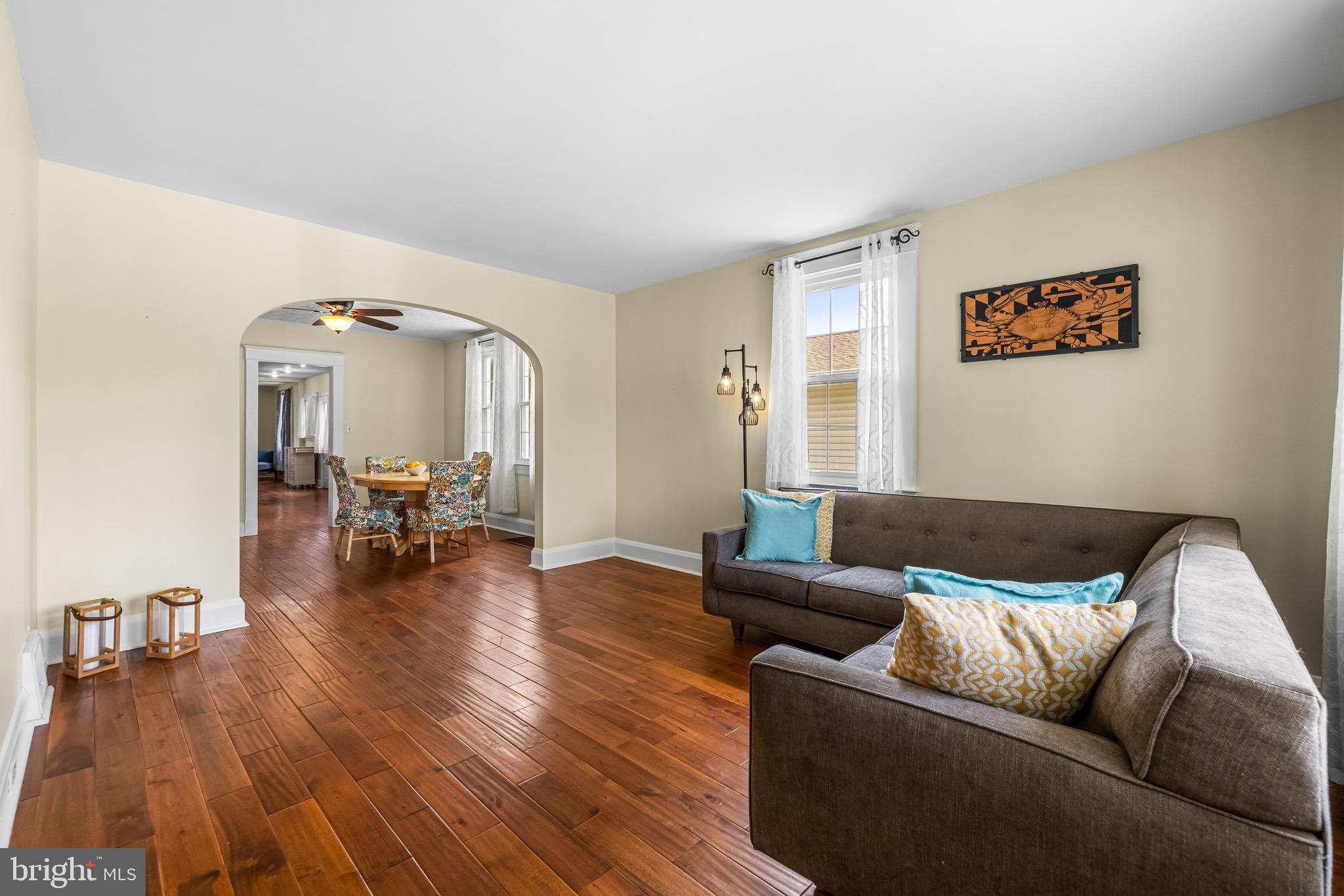 2913 Ritchie Avenue Baltimore, MD 21219 - Photo 4 of 34 a living room with furniture and a wooden floor