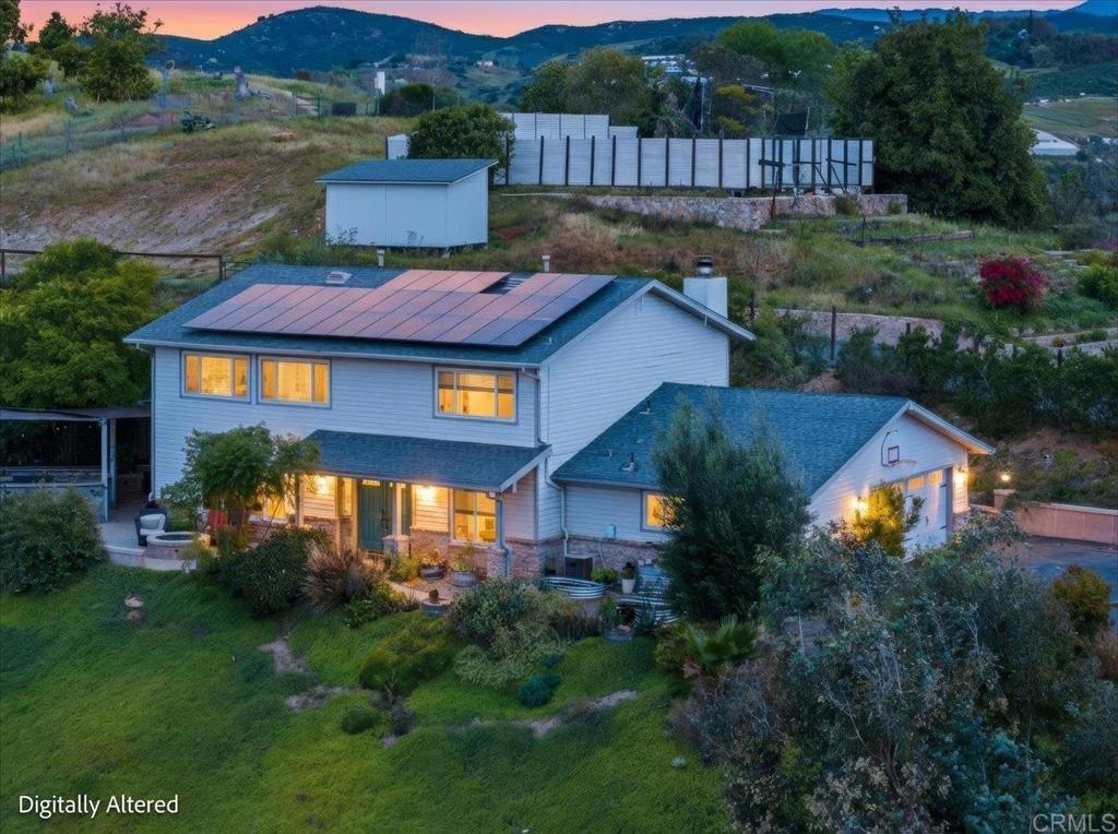 32460 Lilac Road Valley Center, CA 92082 - Photo 1 of 45 a view of a house with a yard plants and large tree