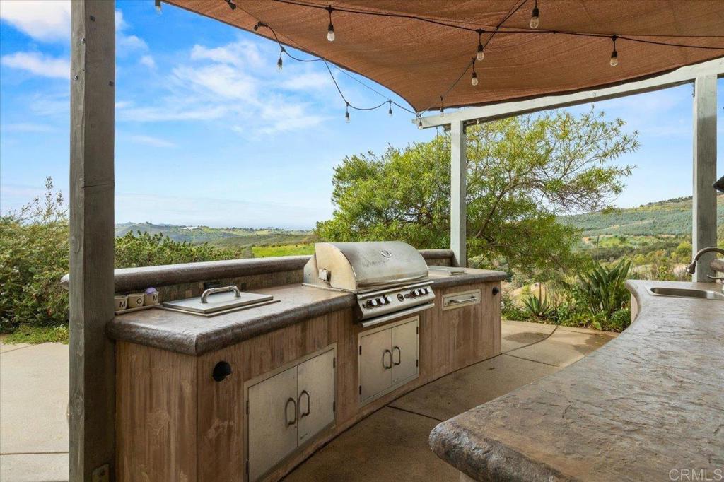 32460 Lilac Road Valley Center, CA 92082 - Photo 14 of 45 a open kitchen with a large window