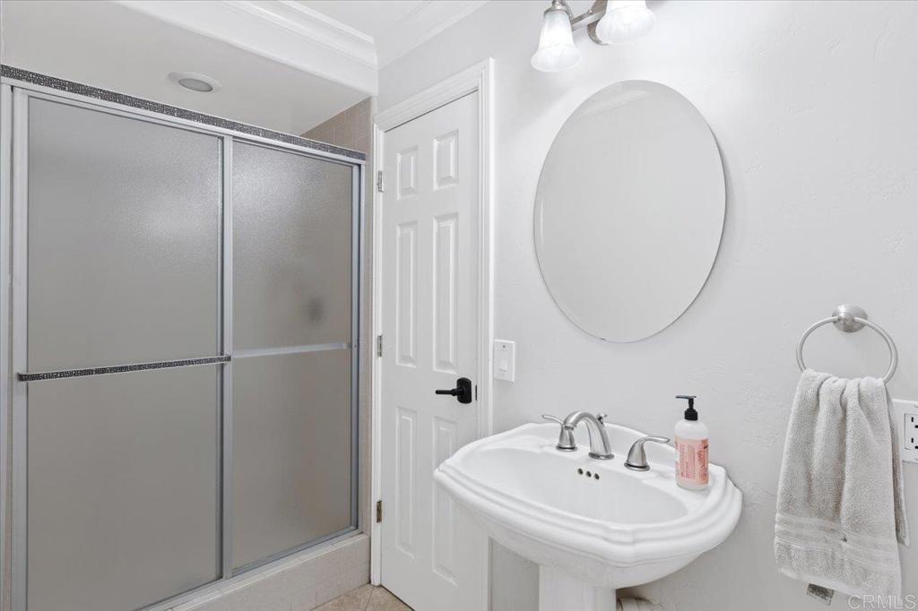 32460 Lilac Road Valley Center, CA 92082 - Photo 17 of 45 a bathroom with a sink and a mirror