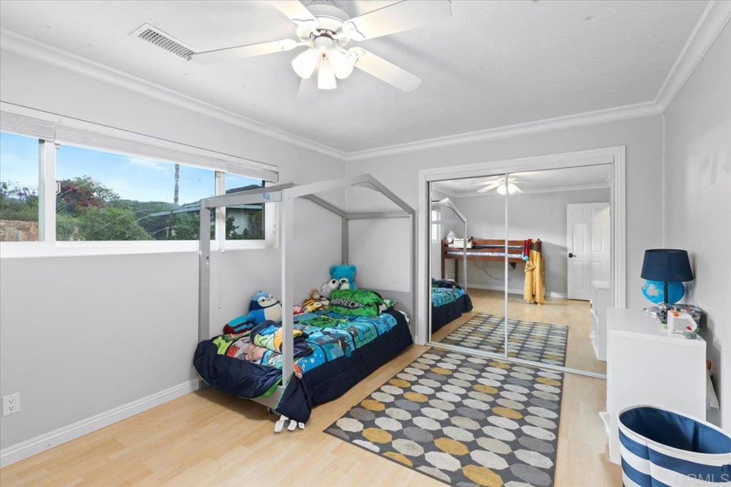 32460 Lilac Road Valley Center, CA 92082 - Photo 24 of 45 a living room with furniture and a large window
